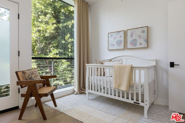 a view of a room with furniture window and wooden floor