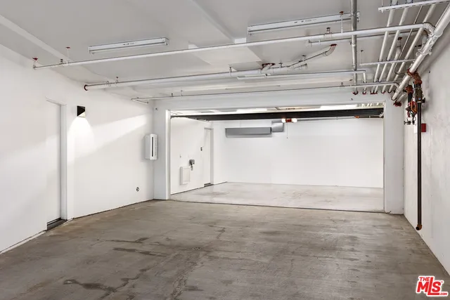 a view of a house with a tree