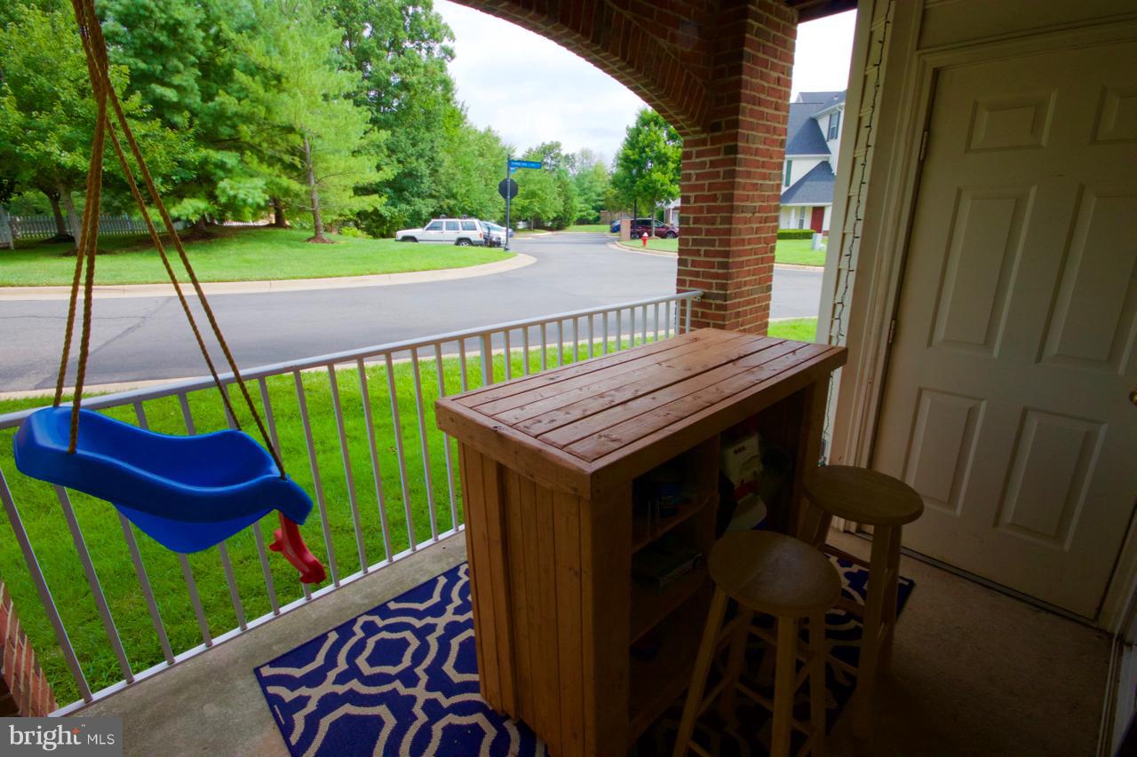 25252 Riffleford Square, Unit 101 Chantilly, VA 20152 - Photo 21 of 30 a view of an outdoor sitting area with a sink