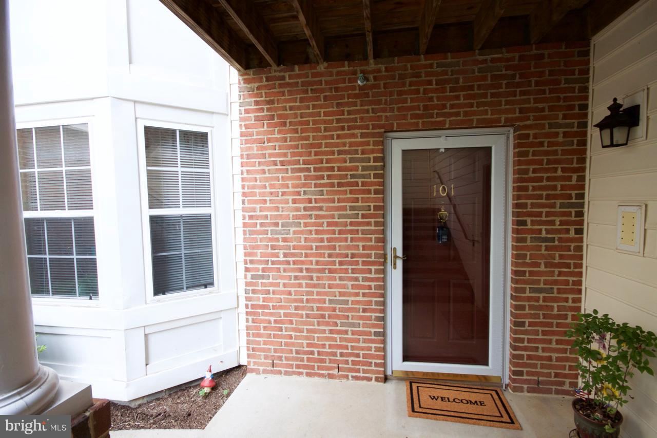 25252 Riffleford Square, Unit 101 Chantilly, VA 20152 - Photo 22 of 30 a view of front door of house