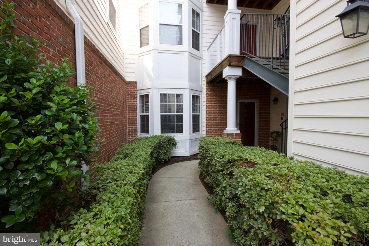 25252 Riffleford Square, Unit 101 Chantilly, VA 20152 - Photo 23 of 30 front view of a house