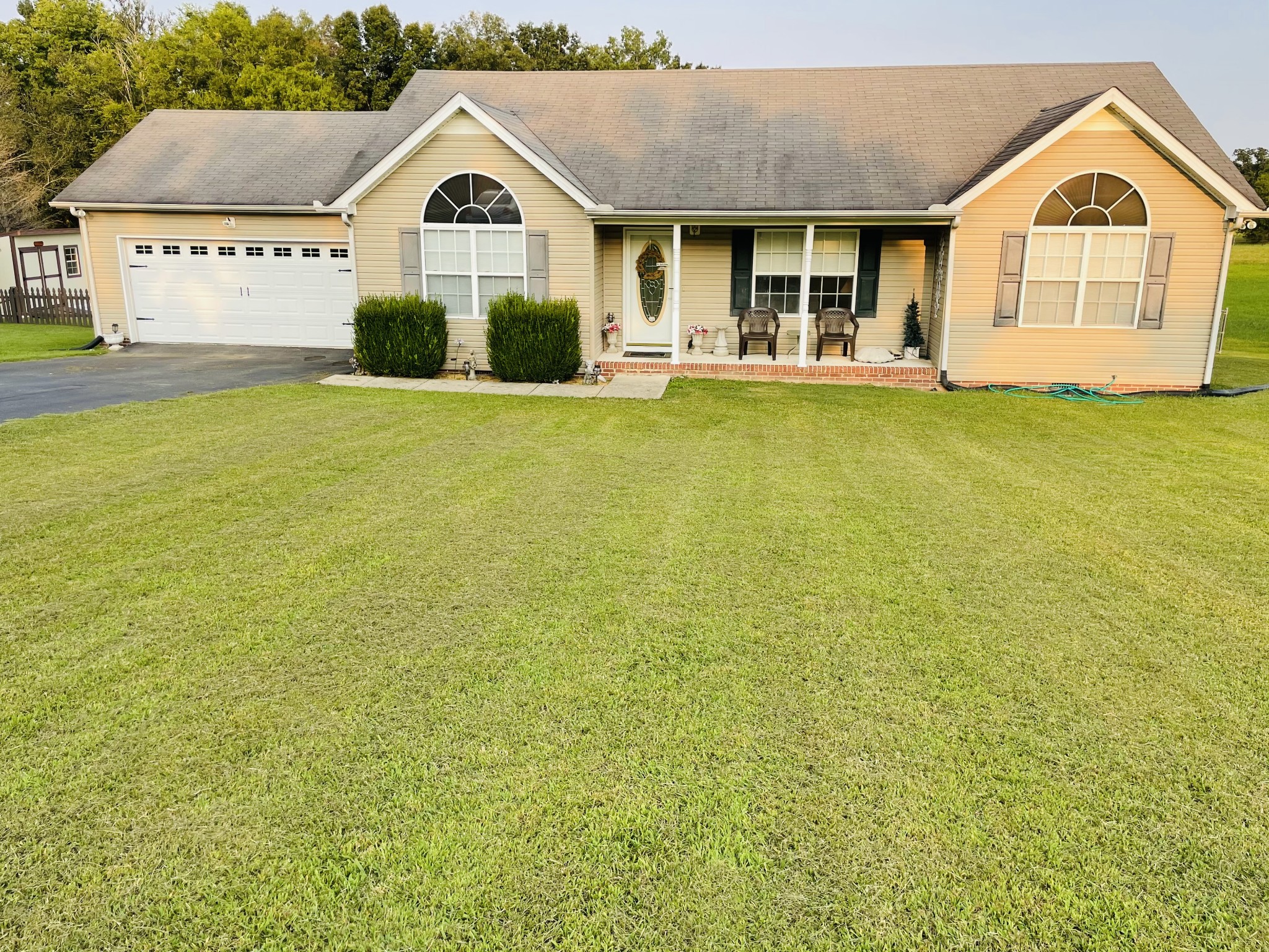 2948 Riley Creek Road Normandy, TN 37360 - Photo 2 of 28 a view of a big house with a big yard and large trees