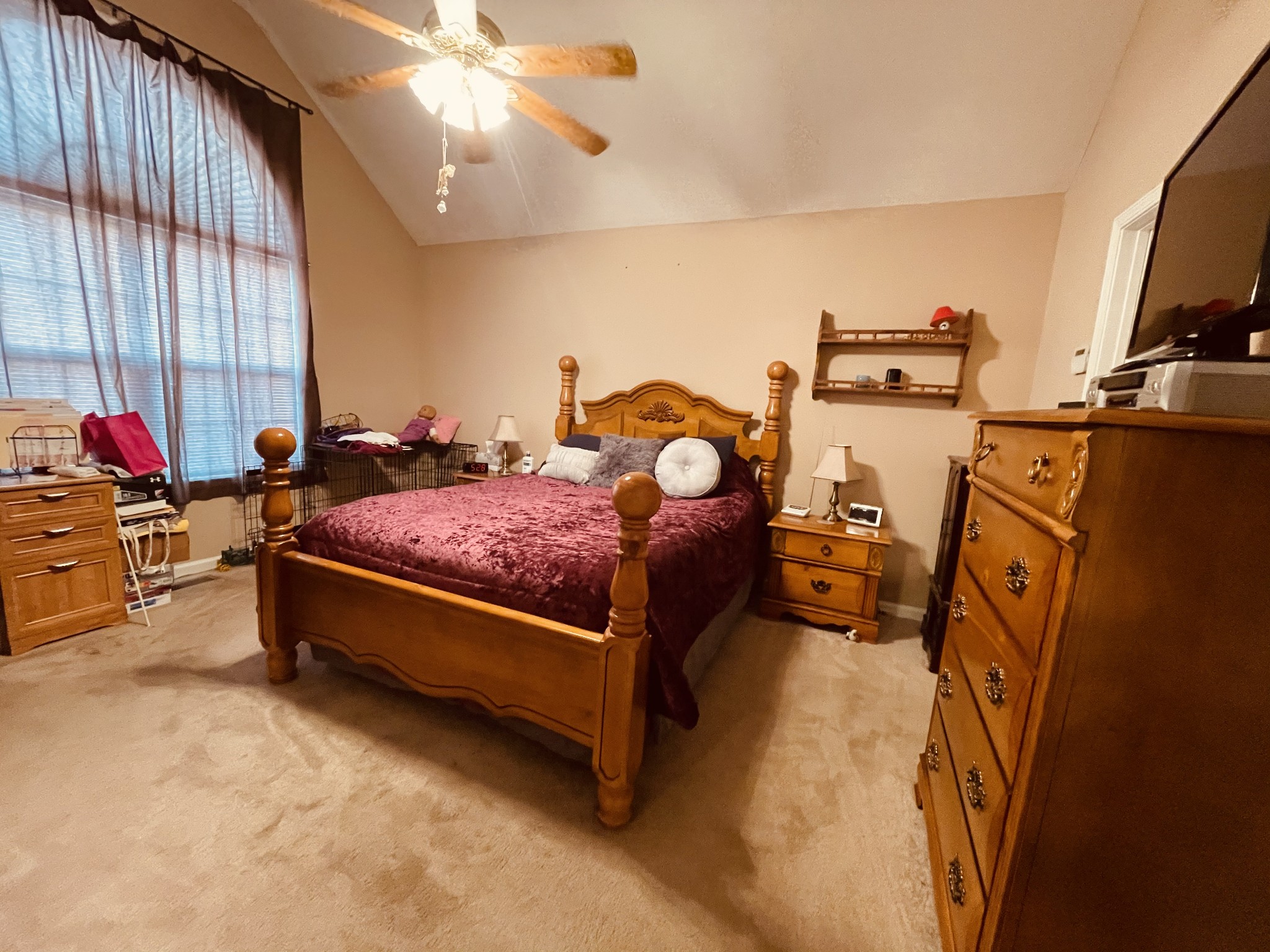 2948 Riley Creek Road Normandy, TN 37360 - Photo 17 of 28 a bed room with furniture and a flat screen tv