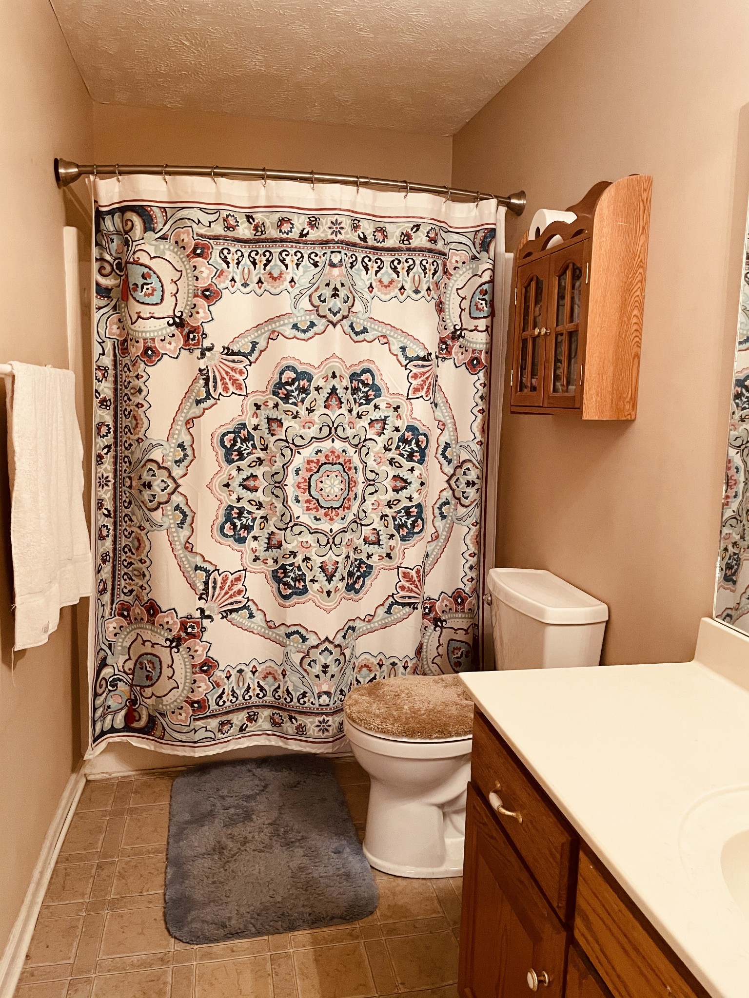 2948 Riley Creek Road Normandy, TN 37360 - Photo 19 of 28 a bathroom with a toilet and a shower curtain