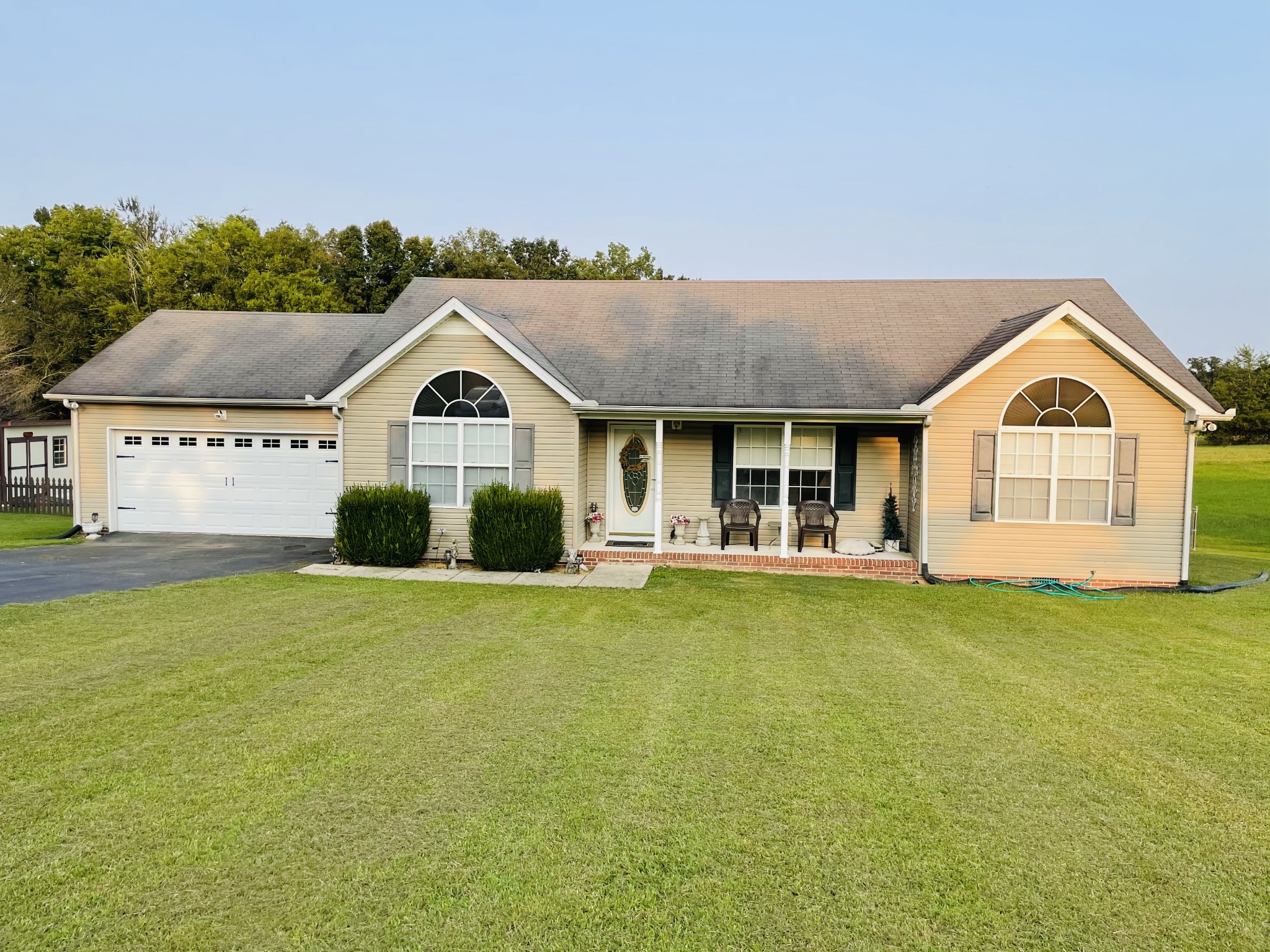 2948 Riley Creek Road Normandy, TN 37360 - Photo 22 of 28 a front view of a house with garden