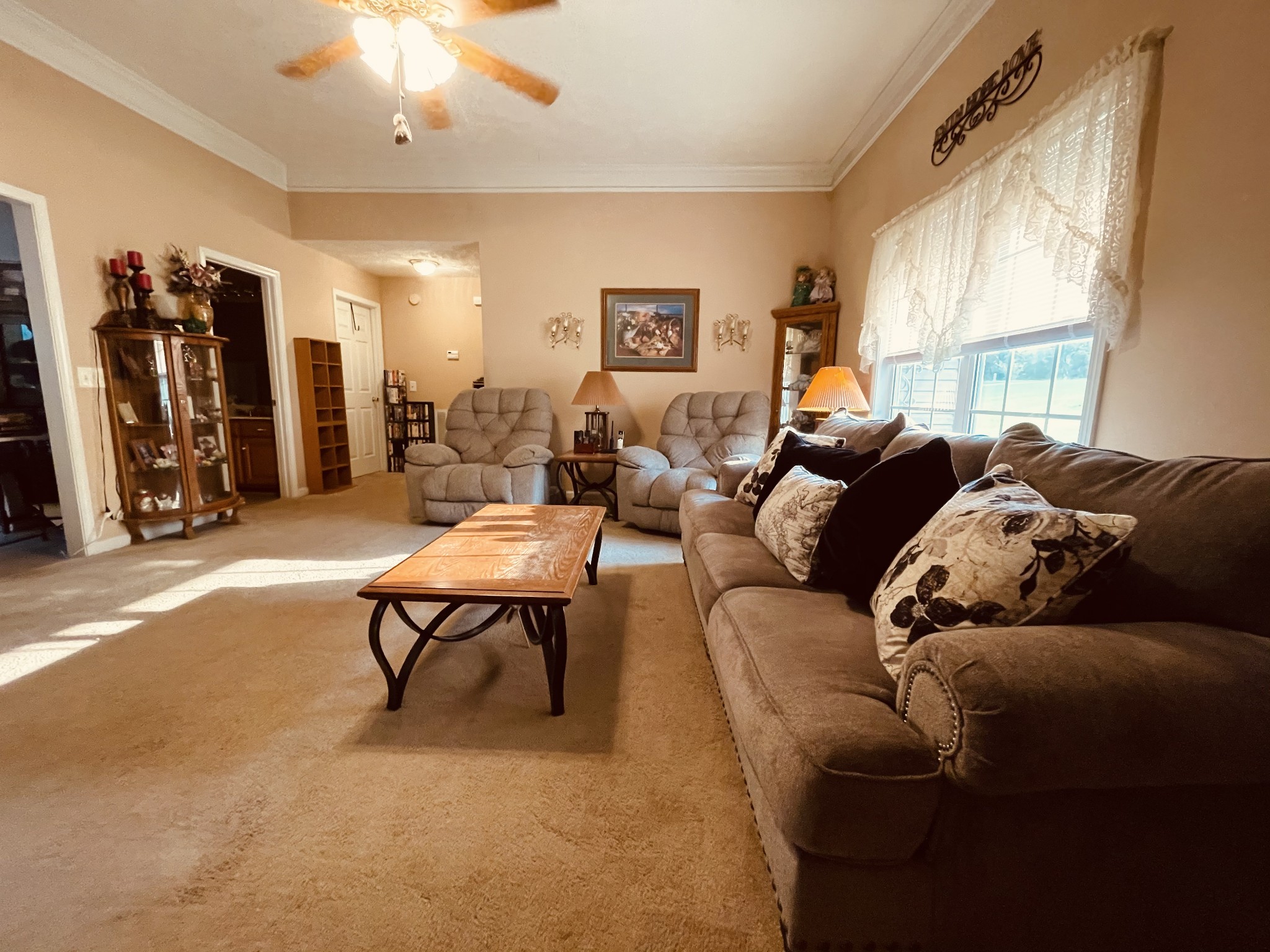 2948 Riley Creek Road Normandy, TN 37360 - Photo 7 of 28 a living room with furniture a window and a flat screen tv
