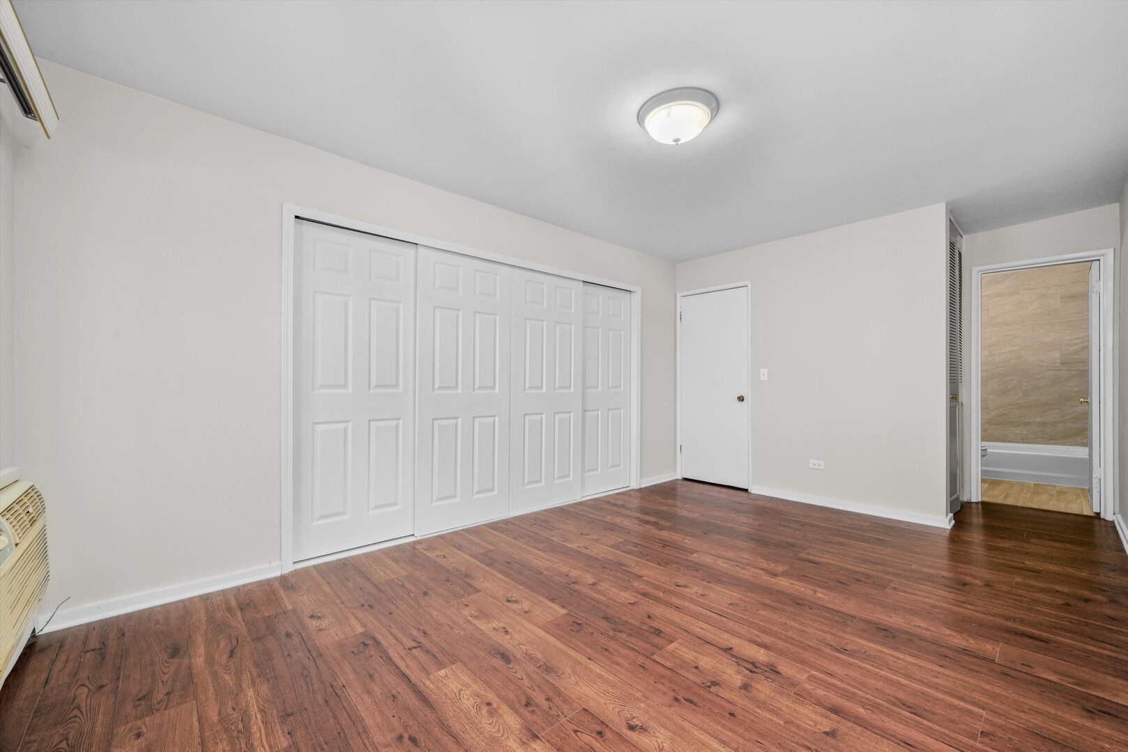 3617 Central Avenue East, Unit 201 Glenview, IL 60025 - Photo 17 of 21 a view of empty room with wooden floor