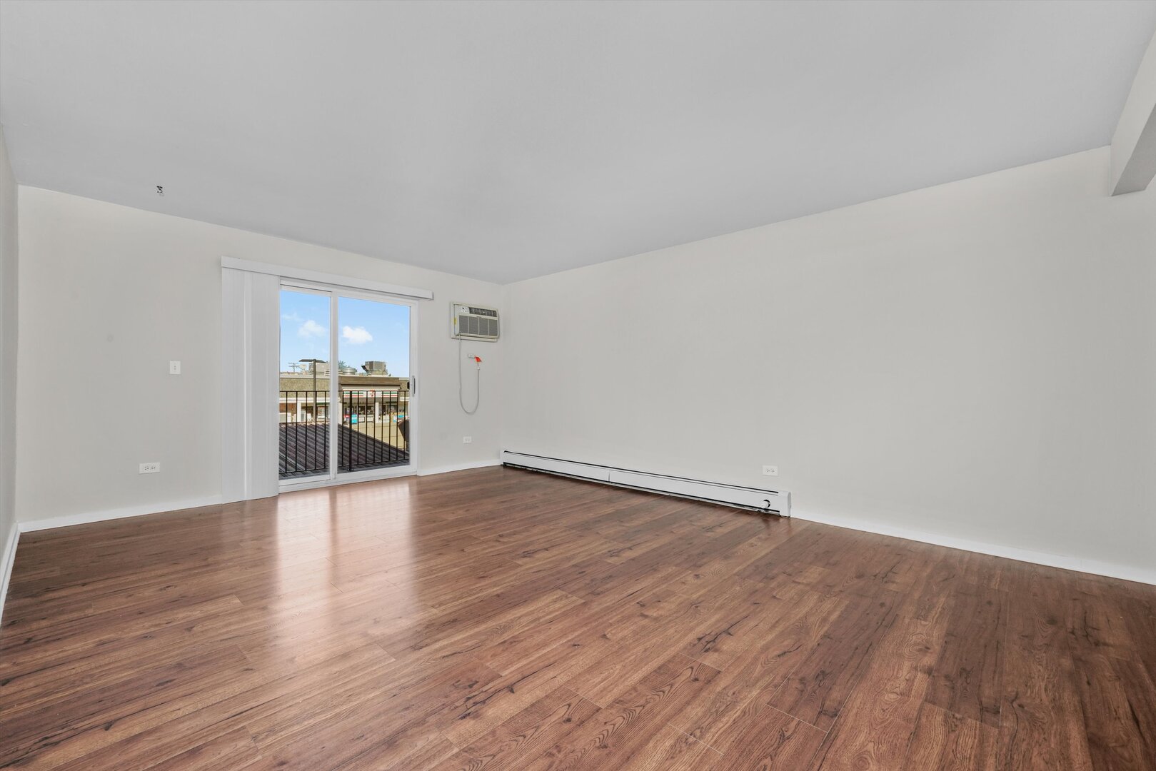 3617 Central Avenue East, Unit 201 Glenview, IL 60025 - Photo 2 of 21 a view of empty room with wooden floor