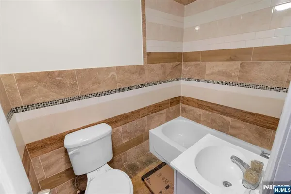 a bathroom with a sink and a toilet