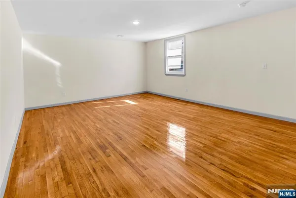 a front view of a building with many windows