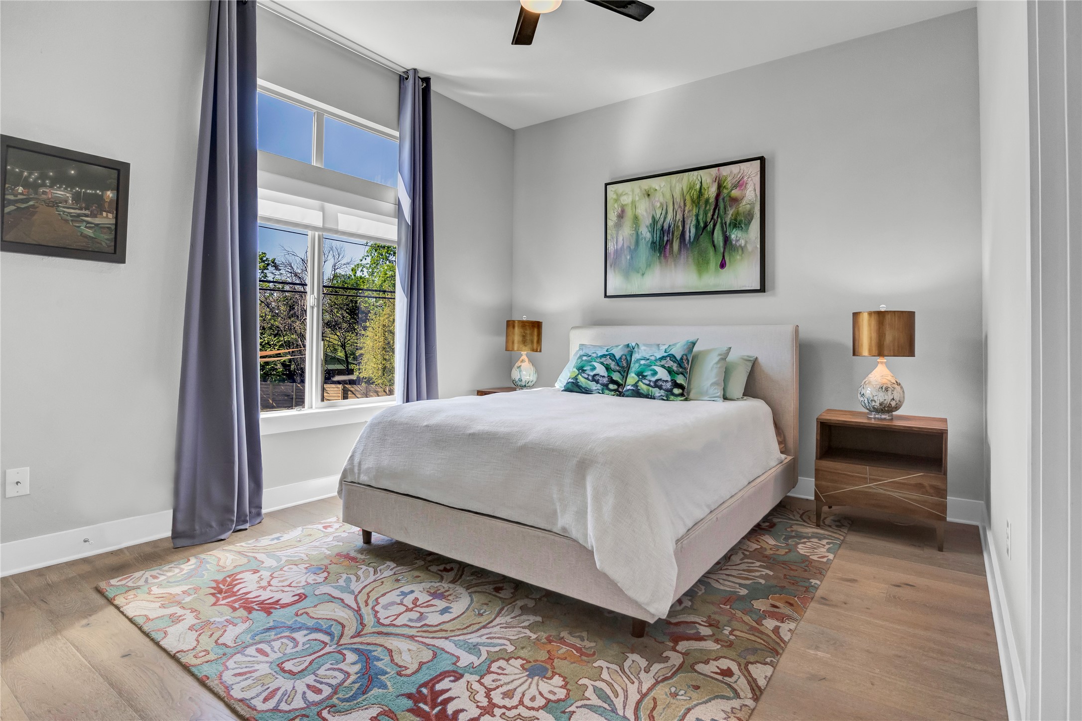 3504 Clawson Road, Unit 7 Austin, TX 78704 - Photo 12 of 26 Bedroom featuring ceiling fan and light wood-style flooring