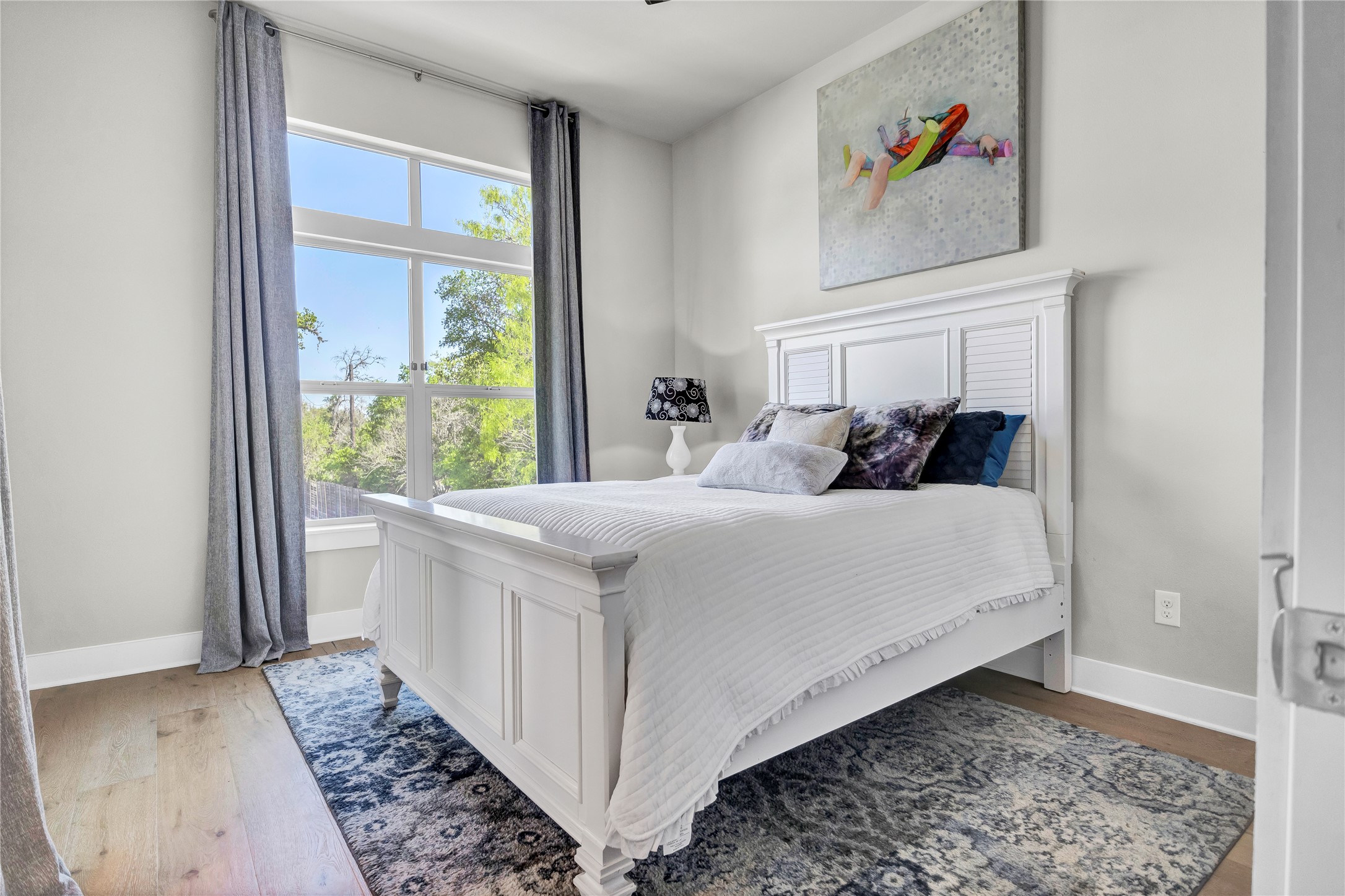 3504 Clawson Road, Unit 7 Austin, TX 78704 - Photo 14 of 26 Bedroom featuring light wood-style flooring
