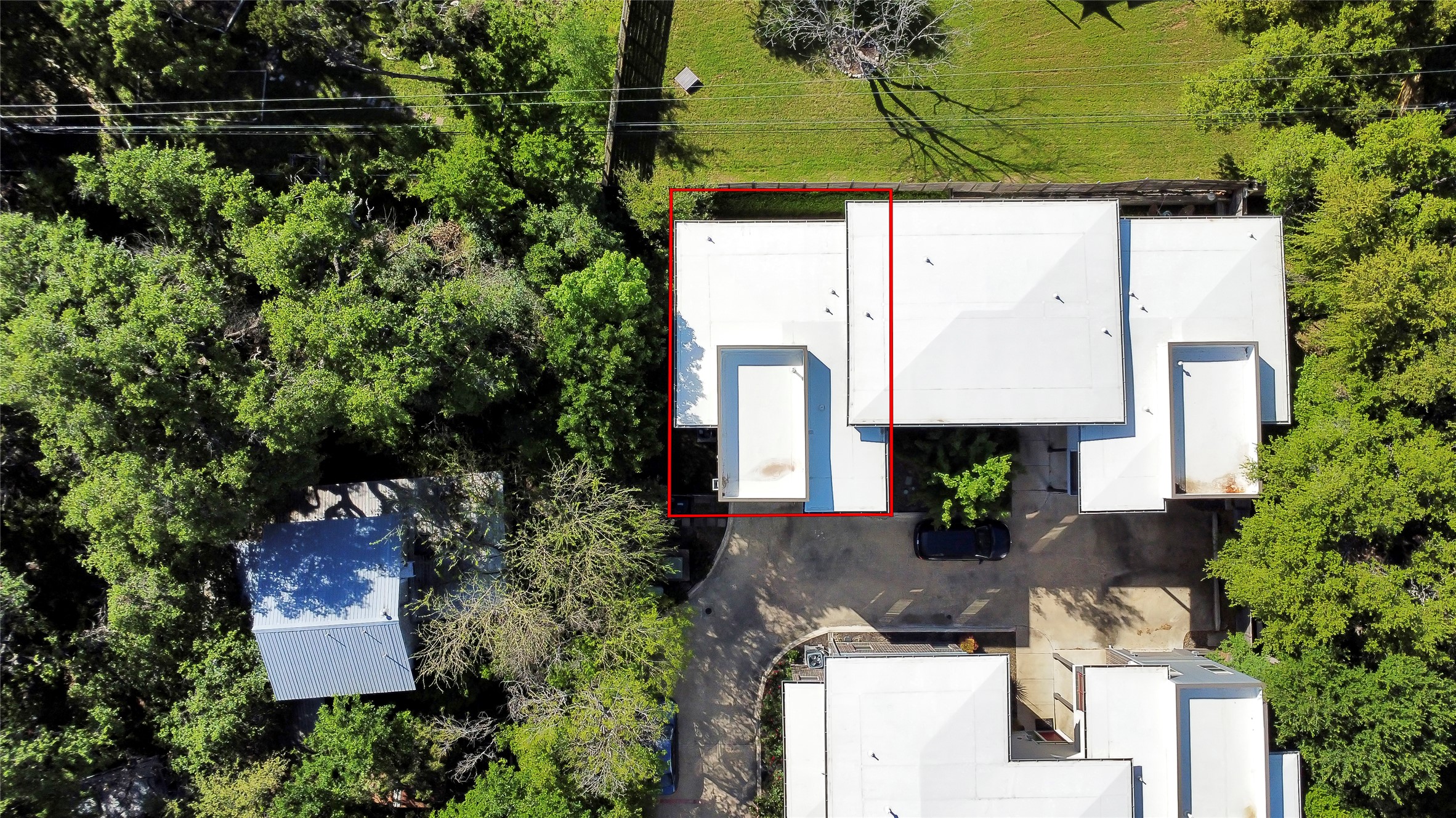 3504 Clawson Road, Unit 7 Austin, TX 78704 - Photo 24 of 26 Aerial view of property and surrounding area with property boundaries highlighted and a tree filled landscape