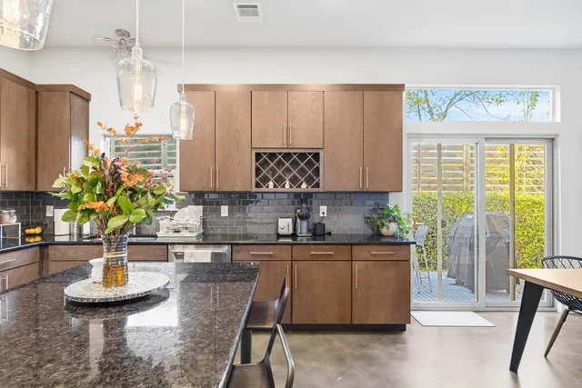 a kitchen with sink and window