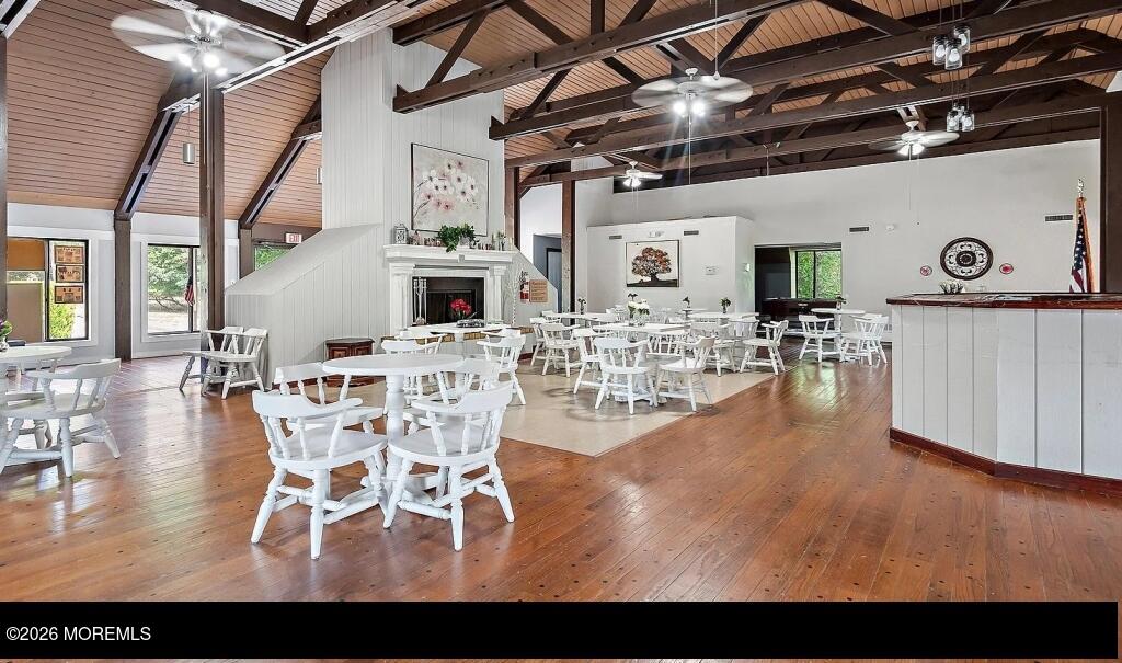 1 Max Place Howell, NJ 07731 - Photo 14 of 16 a view of a dining room with furniture wooden floor and a chandelier