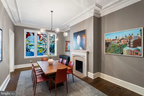 a kitchen with a stove and refrigerator