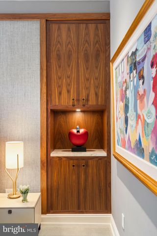 a workspace with furniture window and wooden floor