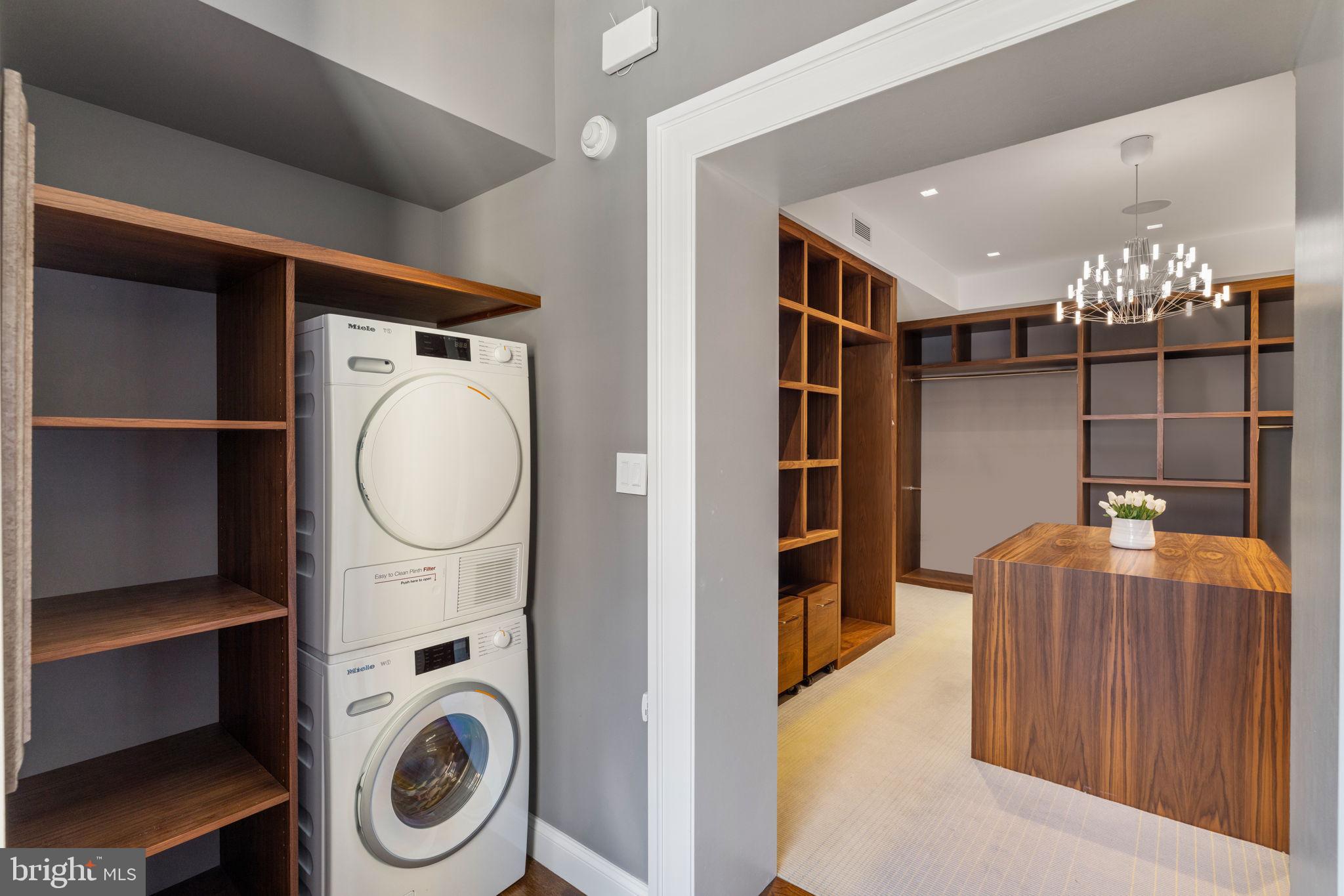 1819 Delancey Place Philadelphia, PA 19103 - Photo 51 of 76 a utility room with dryer and washer