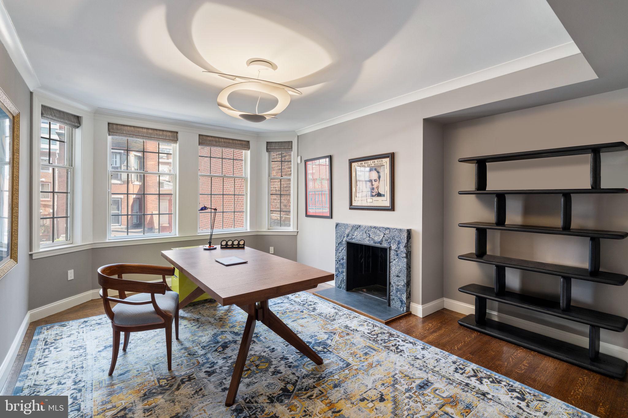 1819 Delancey Place Philadelphia, PA 19103 - Photo 59 of 76 a workspace with furniture window and wooden floor