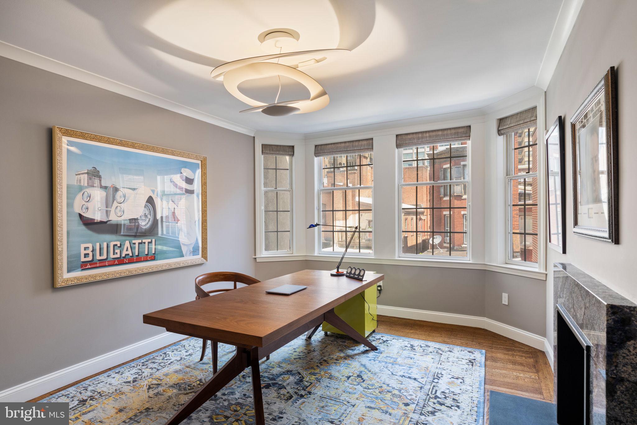 1819 Delancey Place Philadelphia, PA 19103 - Photo 60 of 76 a living room with furniture and a window