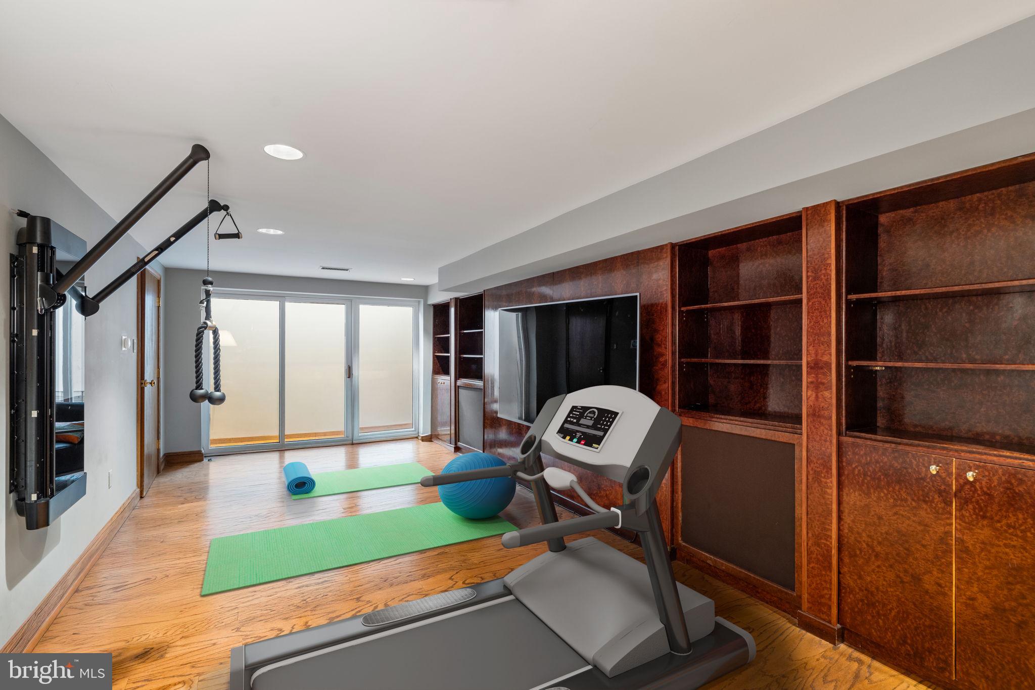 1819 Delancey Place Philadelphia, PA 19103 - Photo 66 of 76 a view of a room with gym equipment