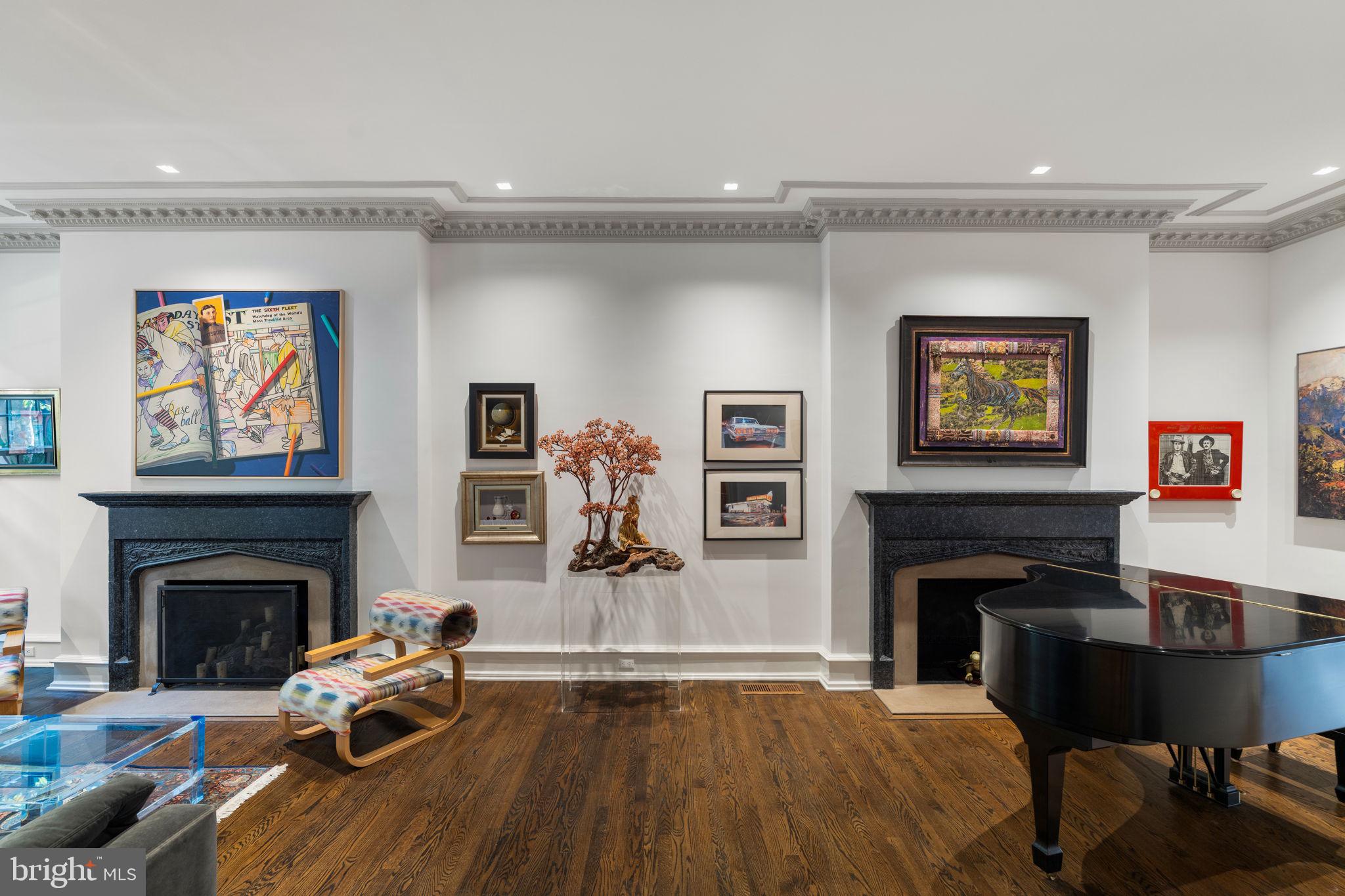 1819 Delancey Place Philadelphia, PA 19103 - Photo 8 of 76 a living room with furniture and a fireplace