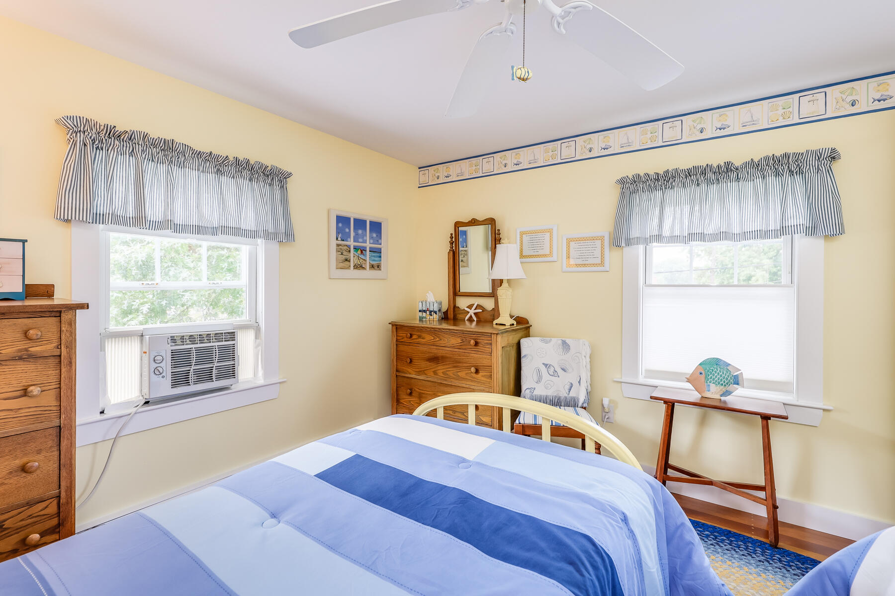 16 Hamilton Road Dennis Port, MA 02639 - Photo 30 of 66 a bedroom with a bed and wooden floor