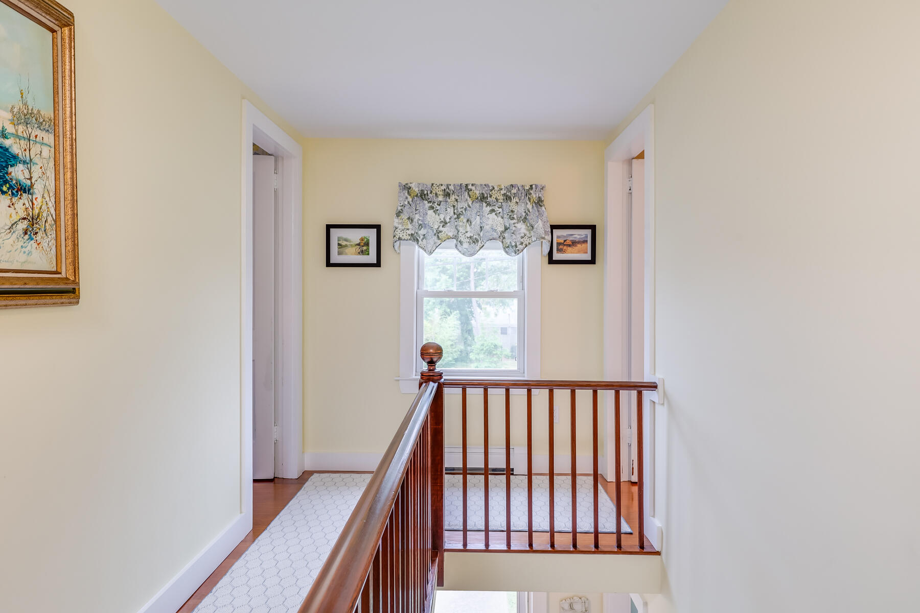16 Hamilton Road Dennis Port, MA 02639 - Photo 31 of 66 a view of a hallway with wooden floor and staircase