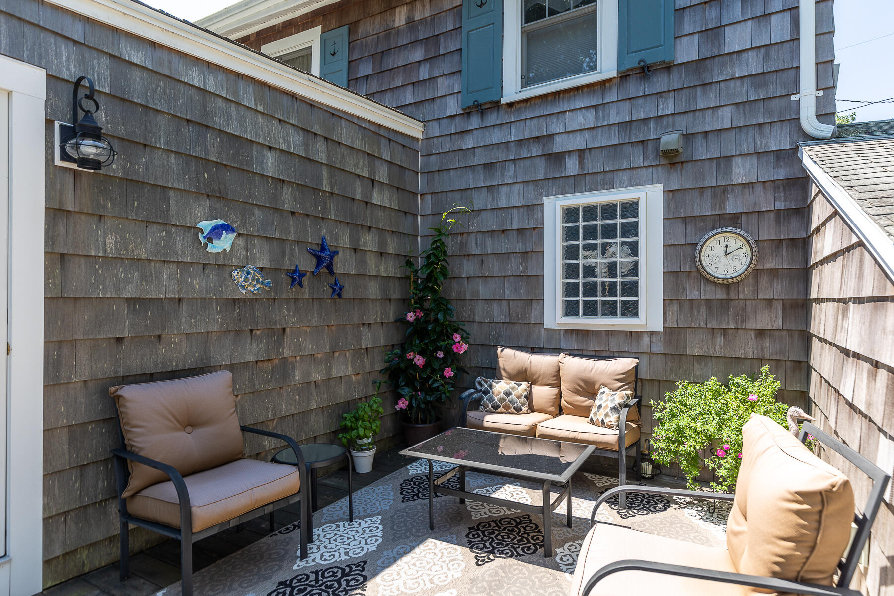 16 Hamilton Road Dennis Port, MA 02639 - Photo 45 of 66 a outdoor living space with patio furniture and garden view