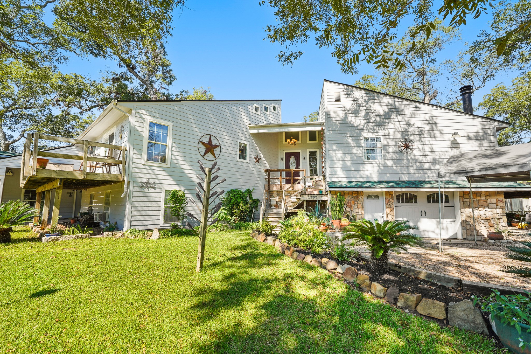 1505 Wagon Road Simonton, TX 77485 - Photo 2 of 50 a view of a house with a yard