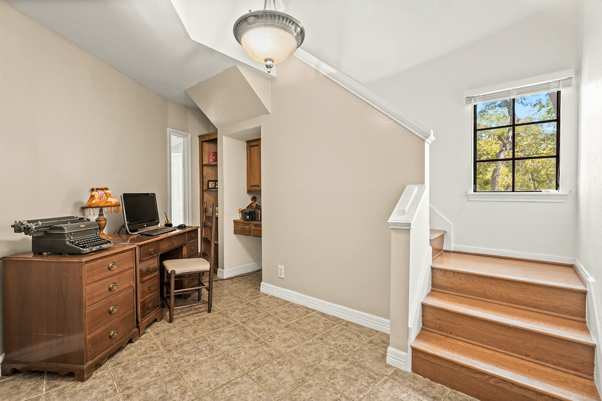 1505 Wagon Road Simonton, TX 77485 - Photo 22 of 50 a view of a workspace with furniture and a window