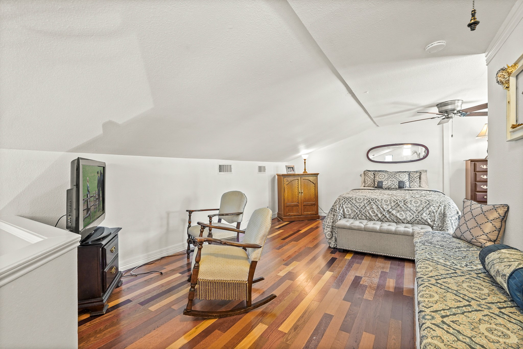 1505 Wagon Road Simonton, TX 77485 - Photo 23 of 50 a bedroom with furniture and wooden floor