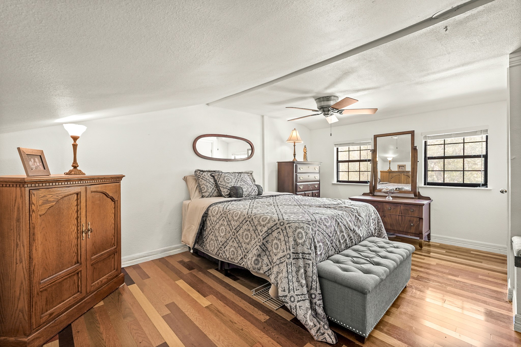 1505 Wagon Road Simonton, TX 77485 - Photo 24 of 50 a bedroom with a bed and wooden floor