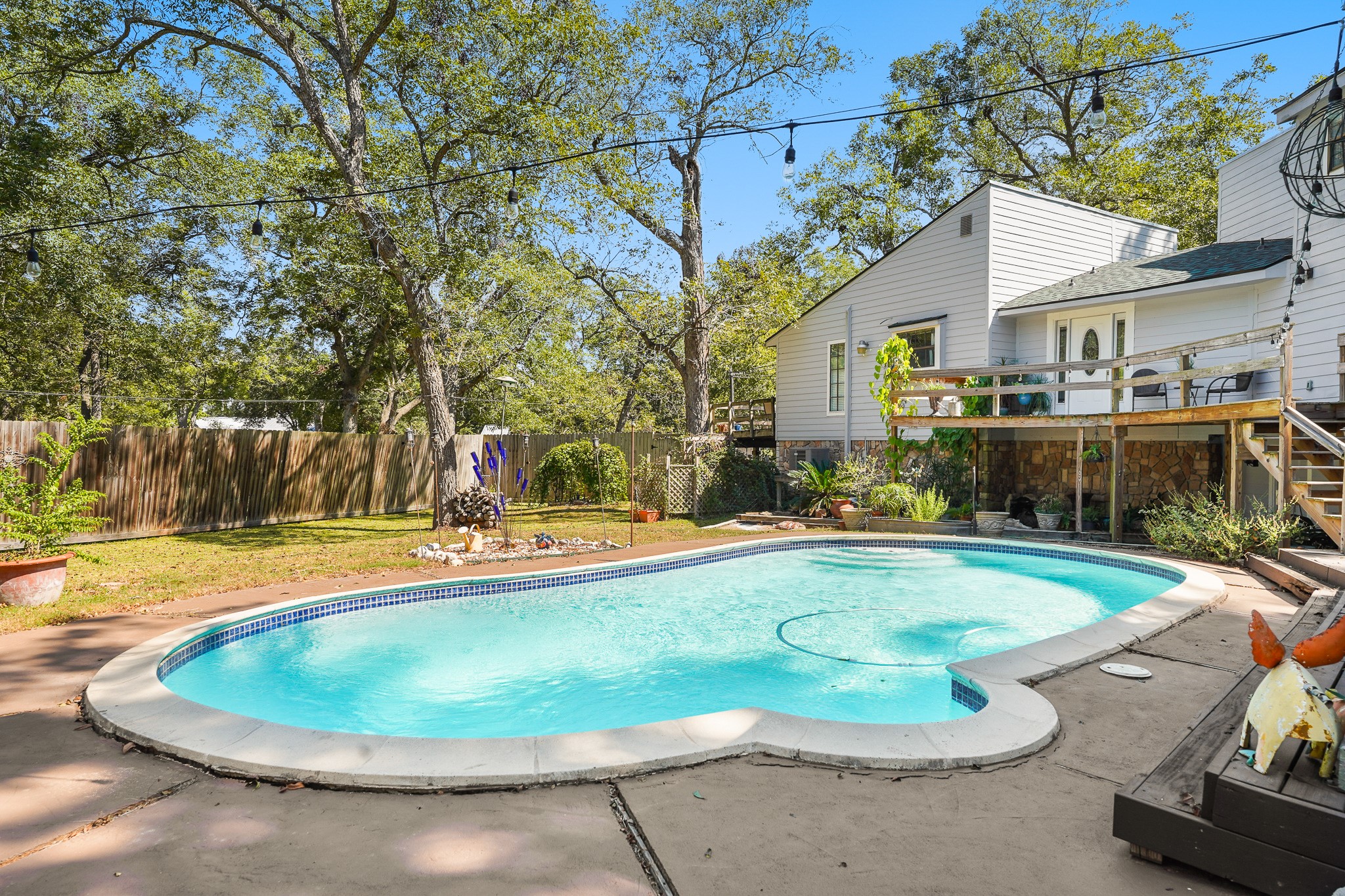 1505 Wagon Road Simonton, TX 77485 - Photo 29 of 50 a view of a swimming pool with a patio