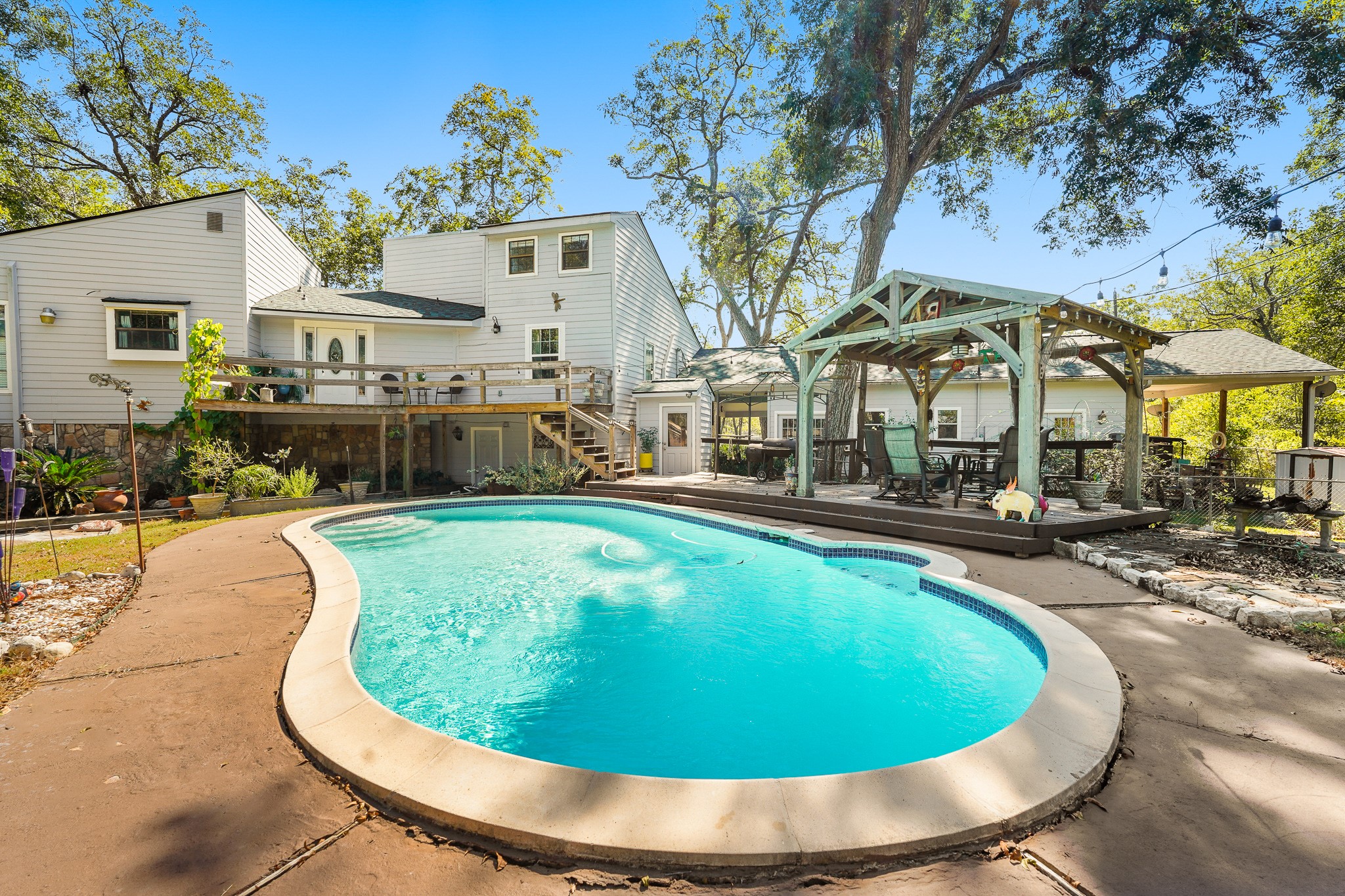 1505 Wagon Road Simonton, TX 77485 - Photo 31 of 50 a view of a swimming pool with outdoor seating