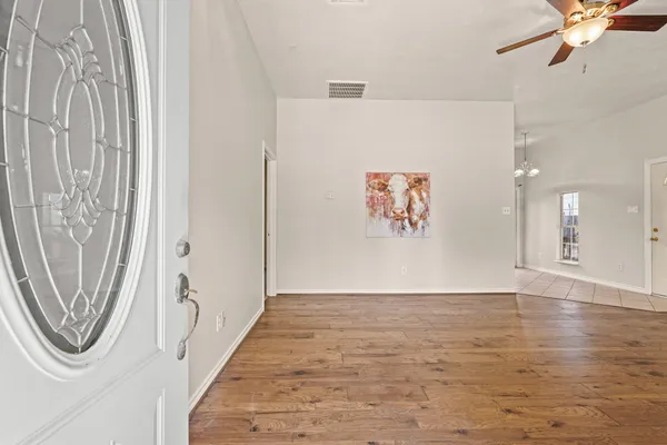 a view of a hallway with painted walls