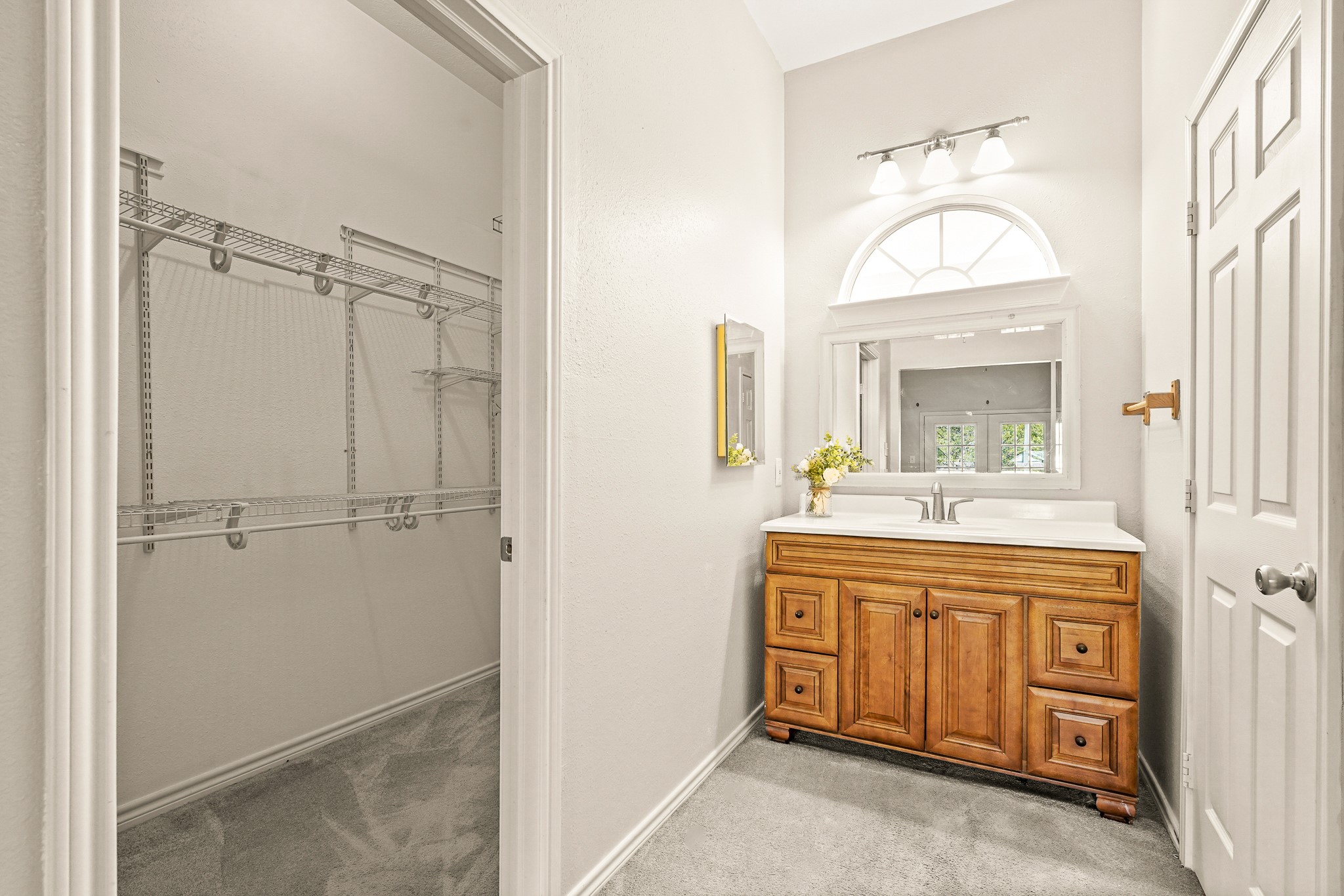 1505 Wagon Road Simonton, TX 77485 - Photo 43 of 50 a bathroom with a granite countertop sink a mirror and a vanity