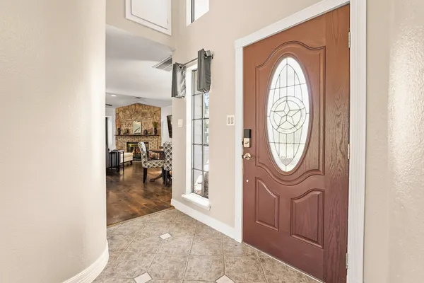 a view of a livingroom with furniture window and wooden floor