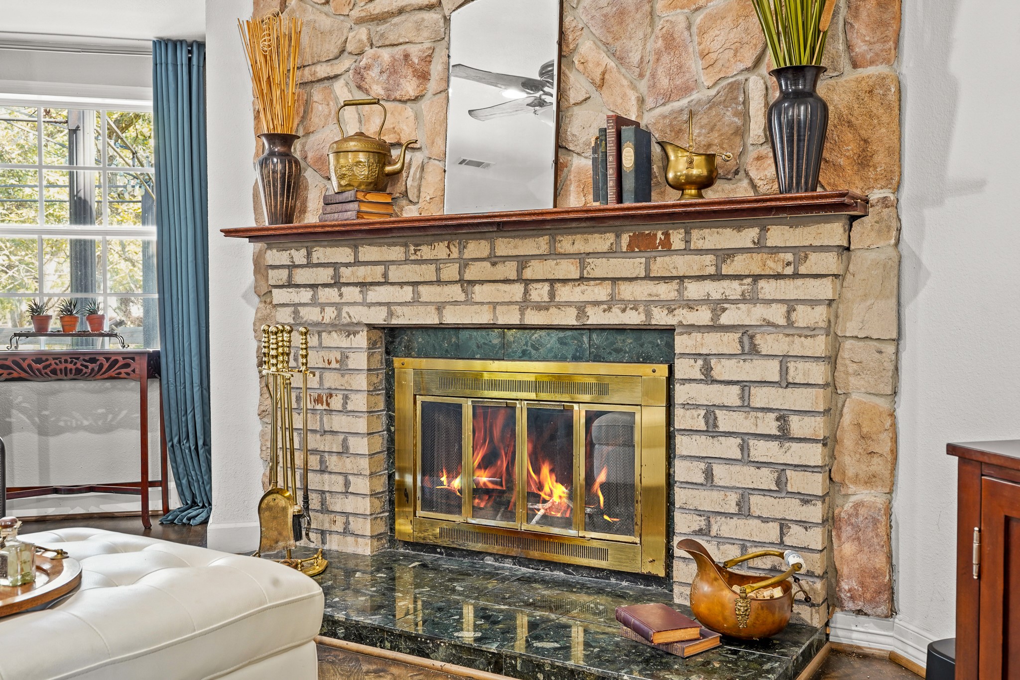 1505 Wagon Road Simonton, TX 77485 - Photo 8 of 50 a living room with a fireplace and a window