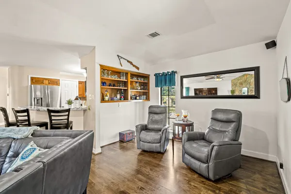 a kitchen with lots of counter top space and appliances
