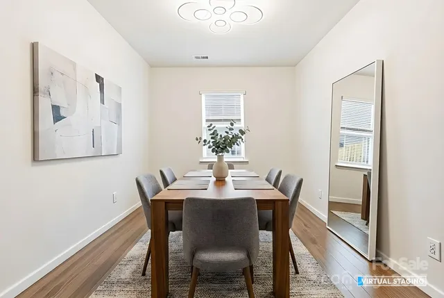 a bathroom with a toilet a sink and a mirror