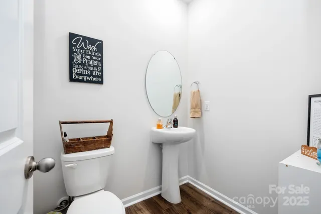 a view of a livingroom with furniture and a window