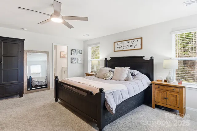 a bathroom with 2 sink and a mirror