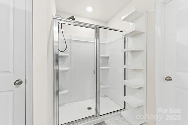 a living room with furniture a couch and a fireplace