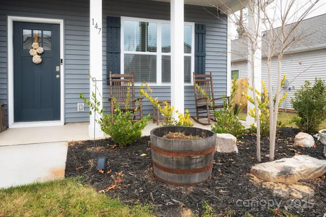 a view of a porch with seating space