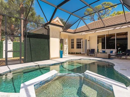 a view of outdoor kitchen and outdoor seating