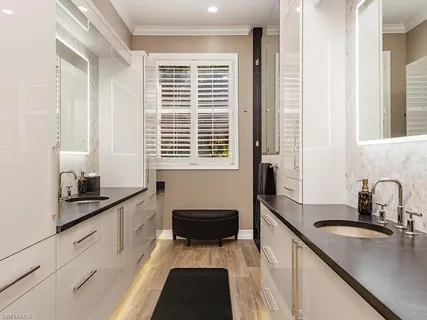 a kitchen with a sink and a window