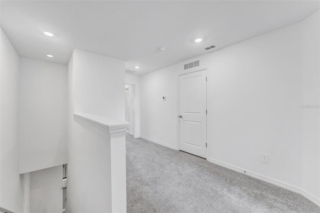 8309 Corner Pine Way New Port Richey, FL 34655 - Photo 13 of 33 a view of an empty room