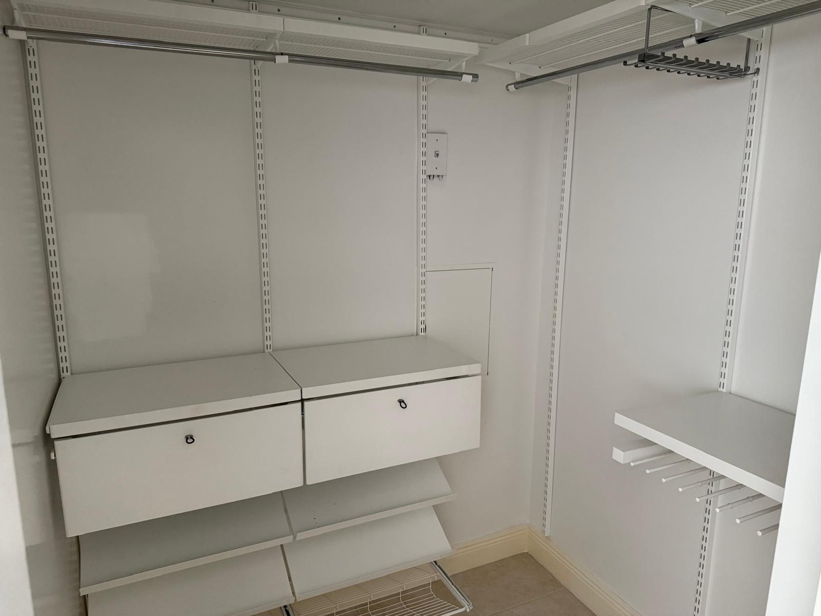 7275 Southwest 90th Way, Unit 311 Miami, FL 33156 - Photo 13 of 17 a view of walk in closet