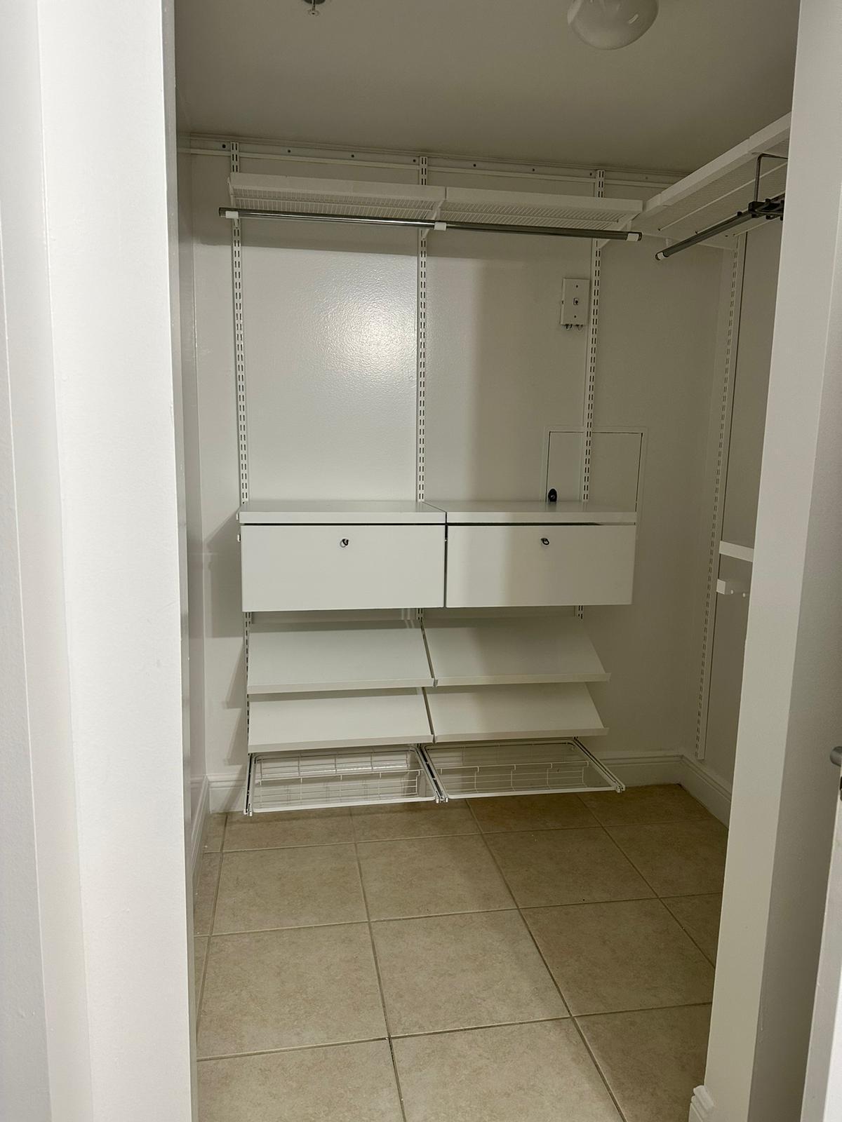 7275 Southwest 90th Way, Unit 311 Miami, FL 33156 - Photo 14 of 17 a empty closet with white paint